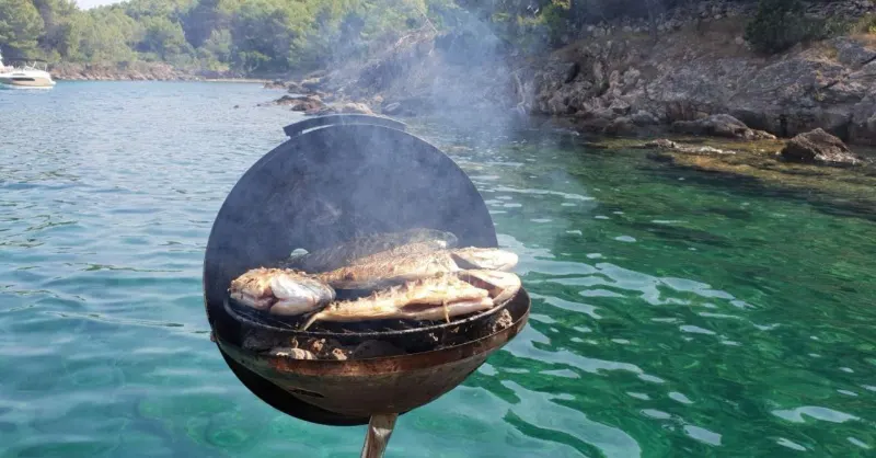 Villi Miri Privlaka Services Fishing Boat Excursion grilled fish on the boat