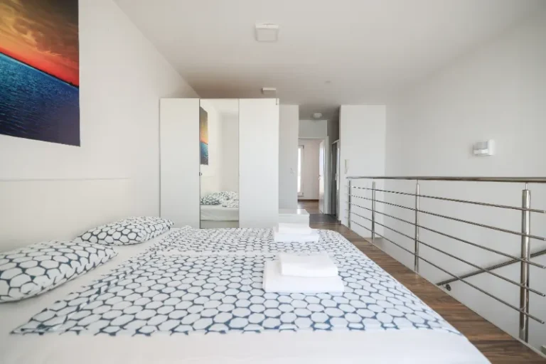 Villa Miri Privlaka Villa Miri Palme Bedroom, bed with blue blankets and wardrobe 4